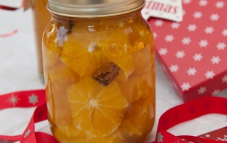 Oranges in brandy in jar